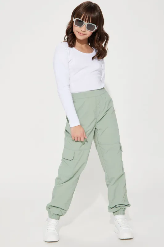 Mini Half The Fun Nylon Parachute Cargo Pants - Sage sold by Fashion Nova