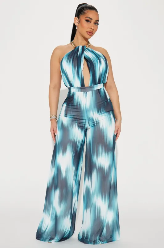 Adventures In Bali Jumpsuit  - Teal/combo sold by Fashion Nova