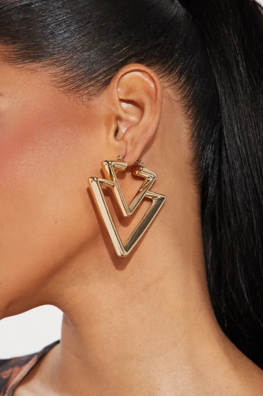Don't Ignore The Signs Earrings - Gold sold by Fashion Nova