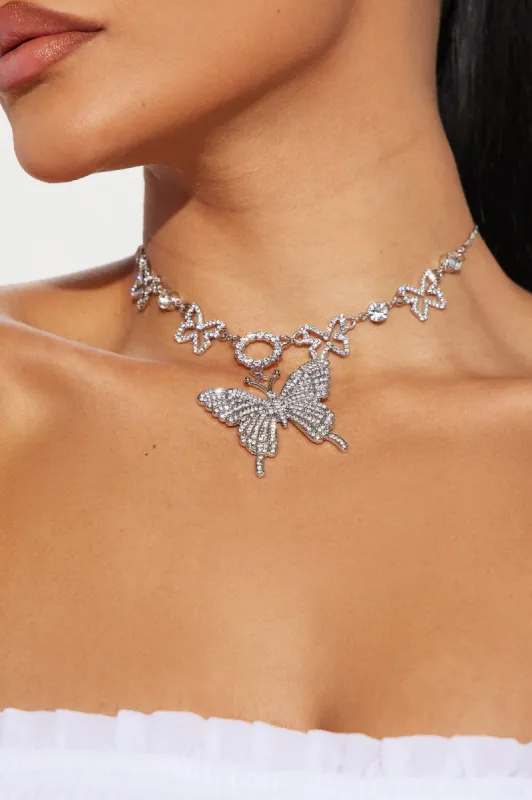 Watch Me Go Butterfly Choker - Silver sold by Fashion Nova