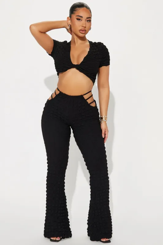 Cut It Out Textured Flare Pant - Black sold by Fashion Nova