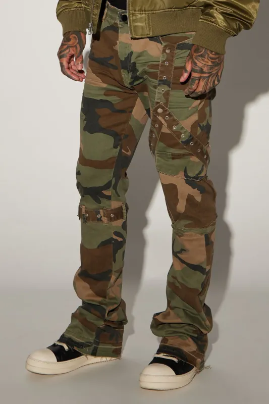 Strap Me Up Stacked Skinny Flare Jeans - Camouflage sold by Fashion Nova