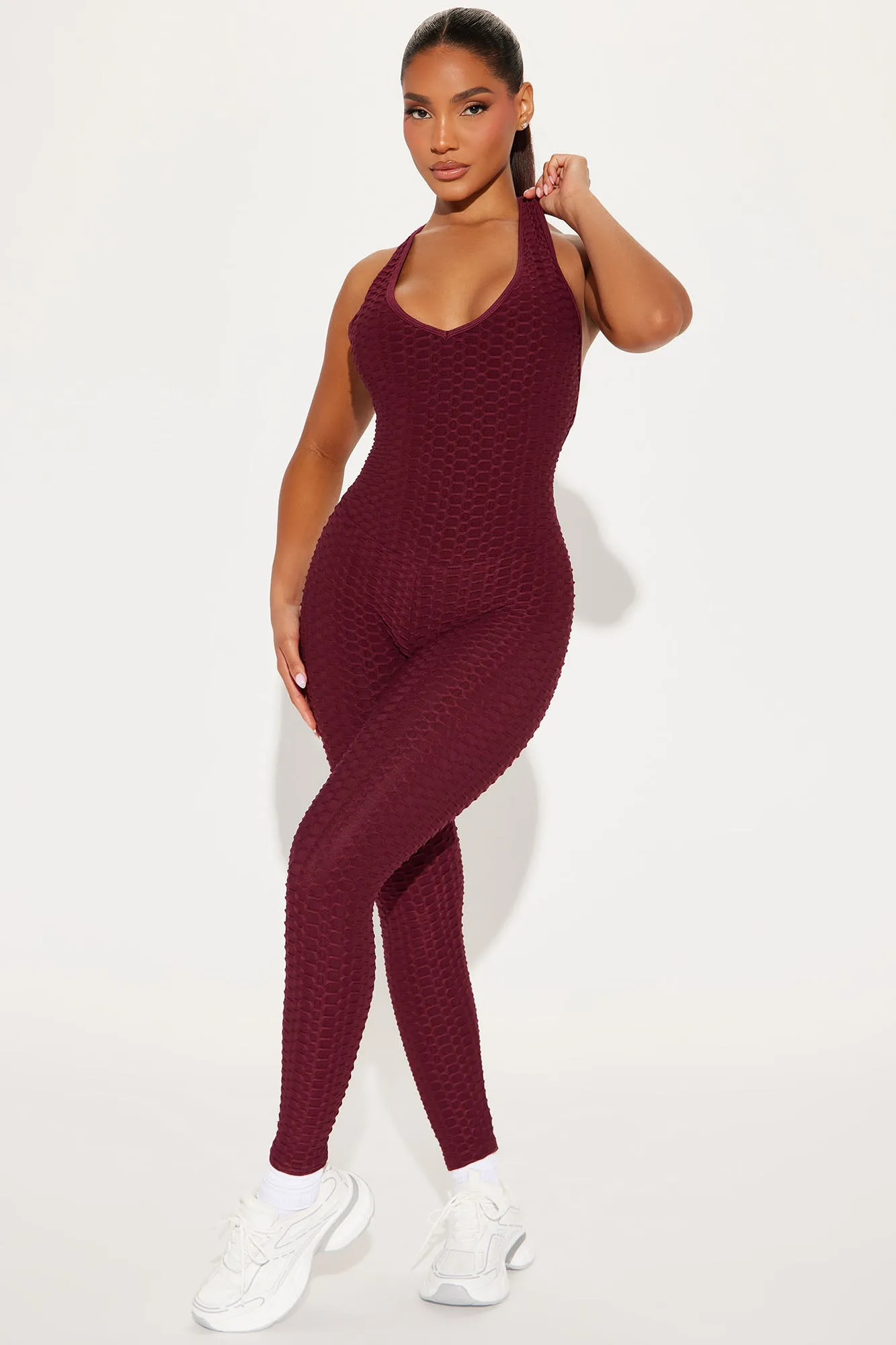 The Best Assets Textured Scrunch Butt Jumpsuit - Burgundy sold by Fashion Nova