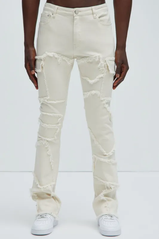 Trapping Frayed Stacked Skinny Flare Pants - Off White sold by Fashion Nova