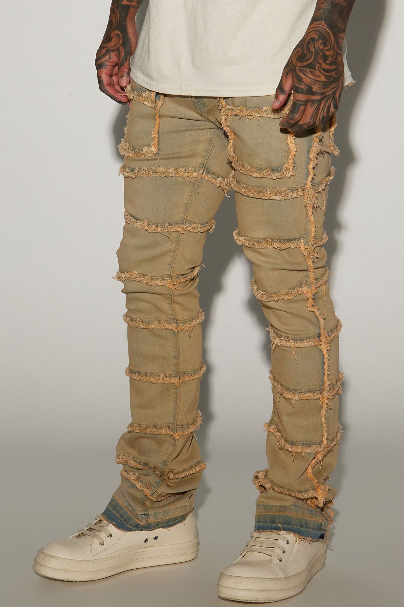 Square Pockets Fray Stacked Skinny Flare Jeans - Light Wash sold by Fashion Nova