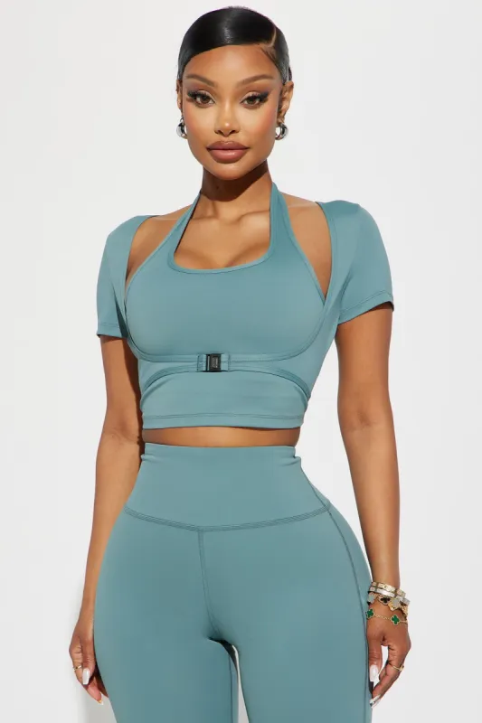 Lily Active Top - Teal sold by Fashion Nova
