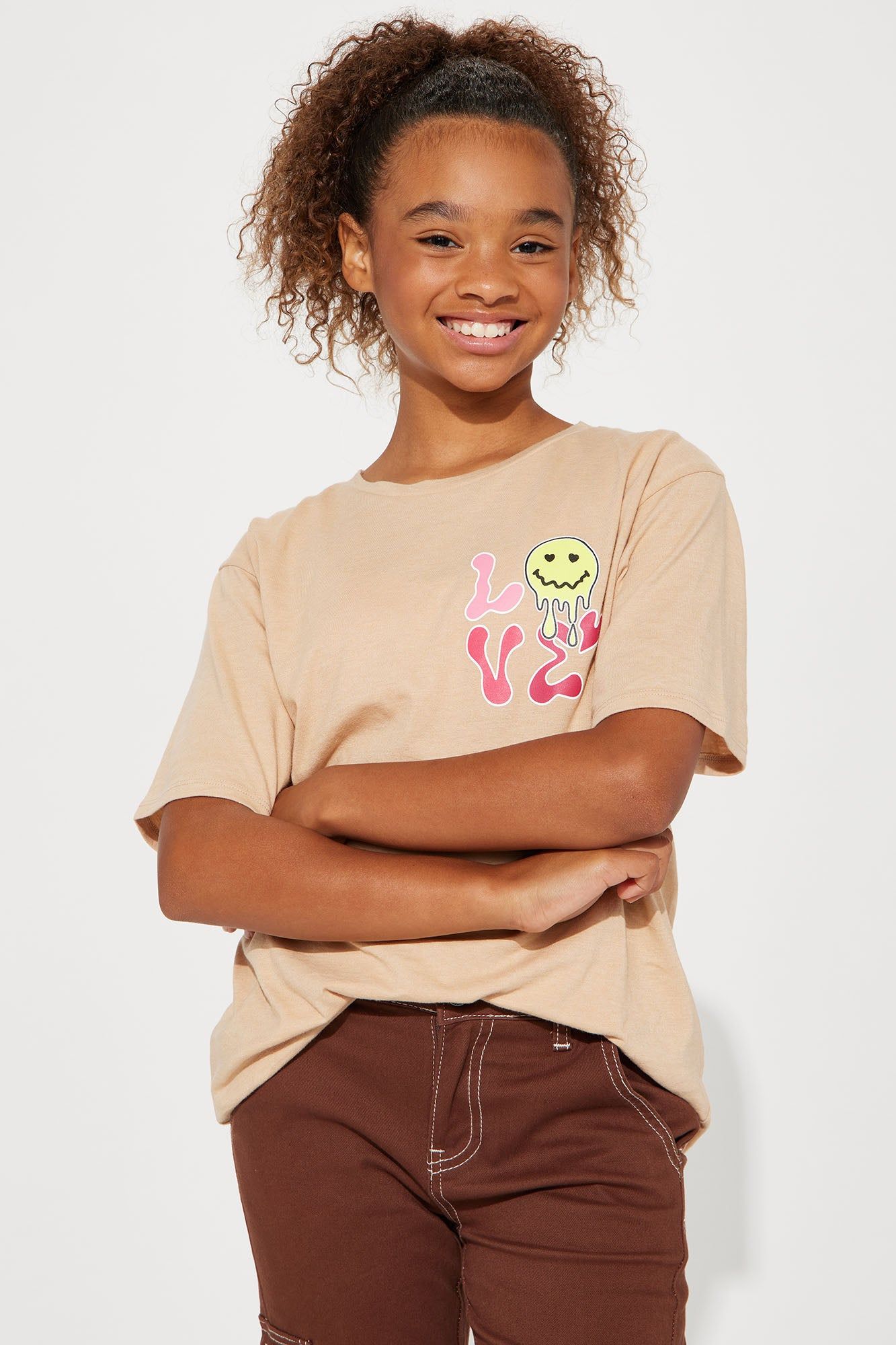 MINI LOVE AND SMILES FRONT/BACK SHORT SLEEVE TEE - Khaki sold by Fashion Nova