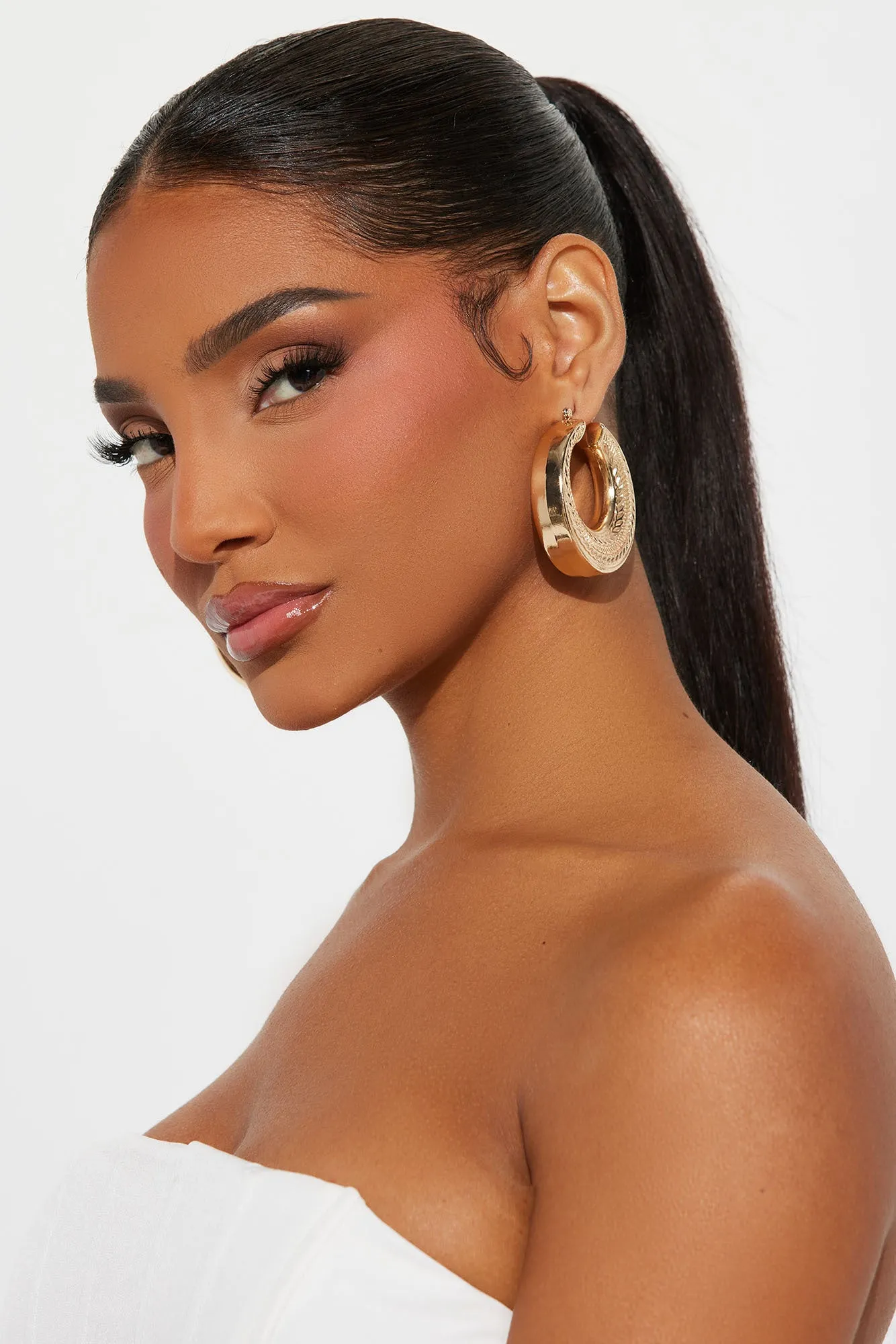 Borrowed Your Heart Hoop Earrings - Gold sold by Fashion Nova product image thumbnail 2