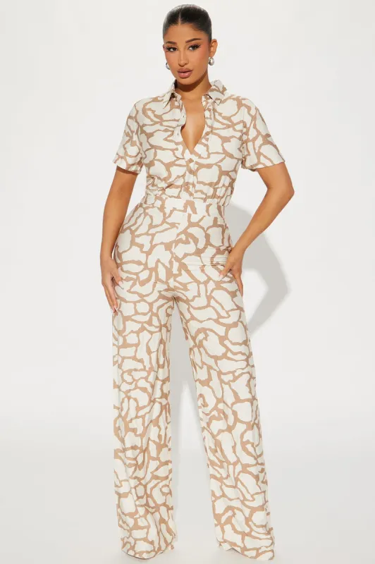 Leila Jumpsuit - Taupe sold by Fashion Nova