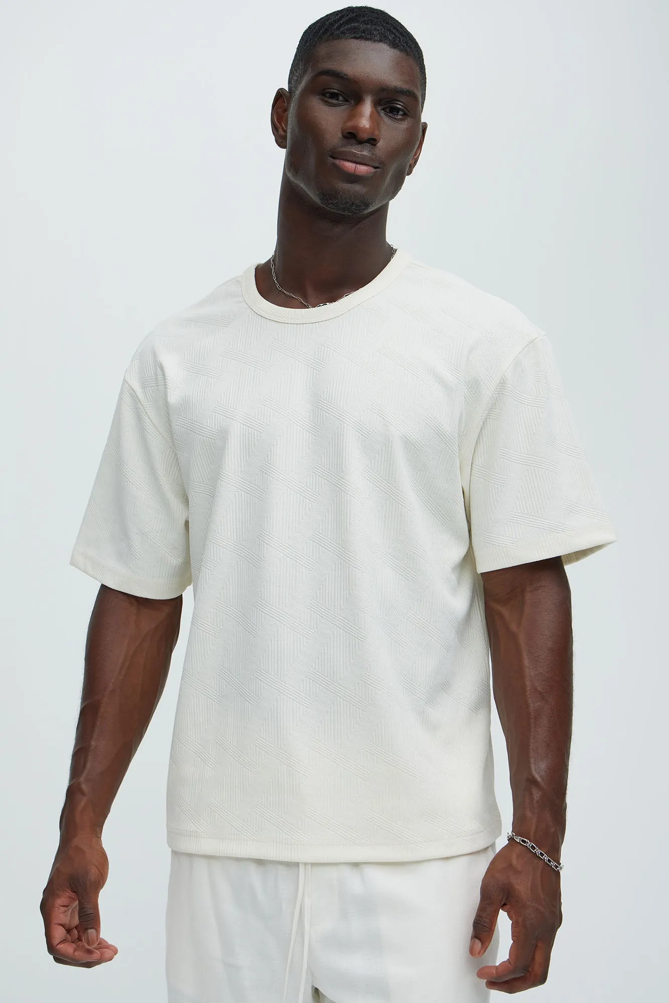 Benji Textured Relaxed Tee - Cream sold by Fashion Nova