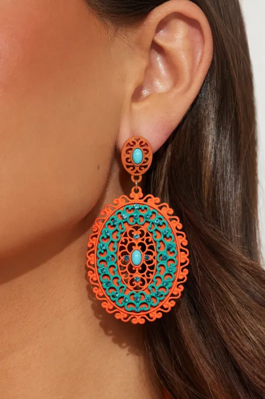 Makes You Wonder Earrings - Orange/combo sold by Fashion Nova