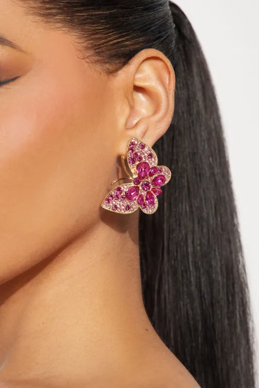 Transformation Era Butterfly Earrings  - Pink sold by Fashion Nova