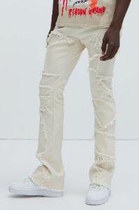 Trapping Frayed Stacked Skinny Flare Pants - Off White sold by Fashion Nova
