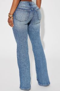 Can't Compete Low Rise Stretch Bootcut Jean - Medium Wash sold by Fashion Nova