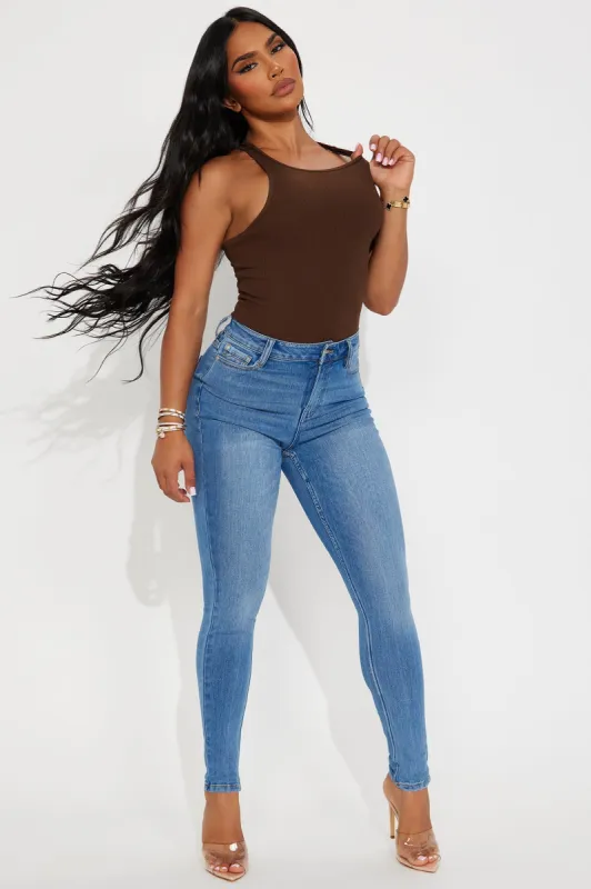 Getting Worked Up Stretch Skinny Jeans - Medium Wash sold by Fashion Nova