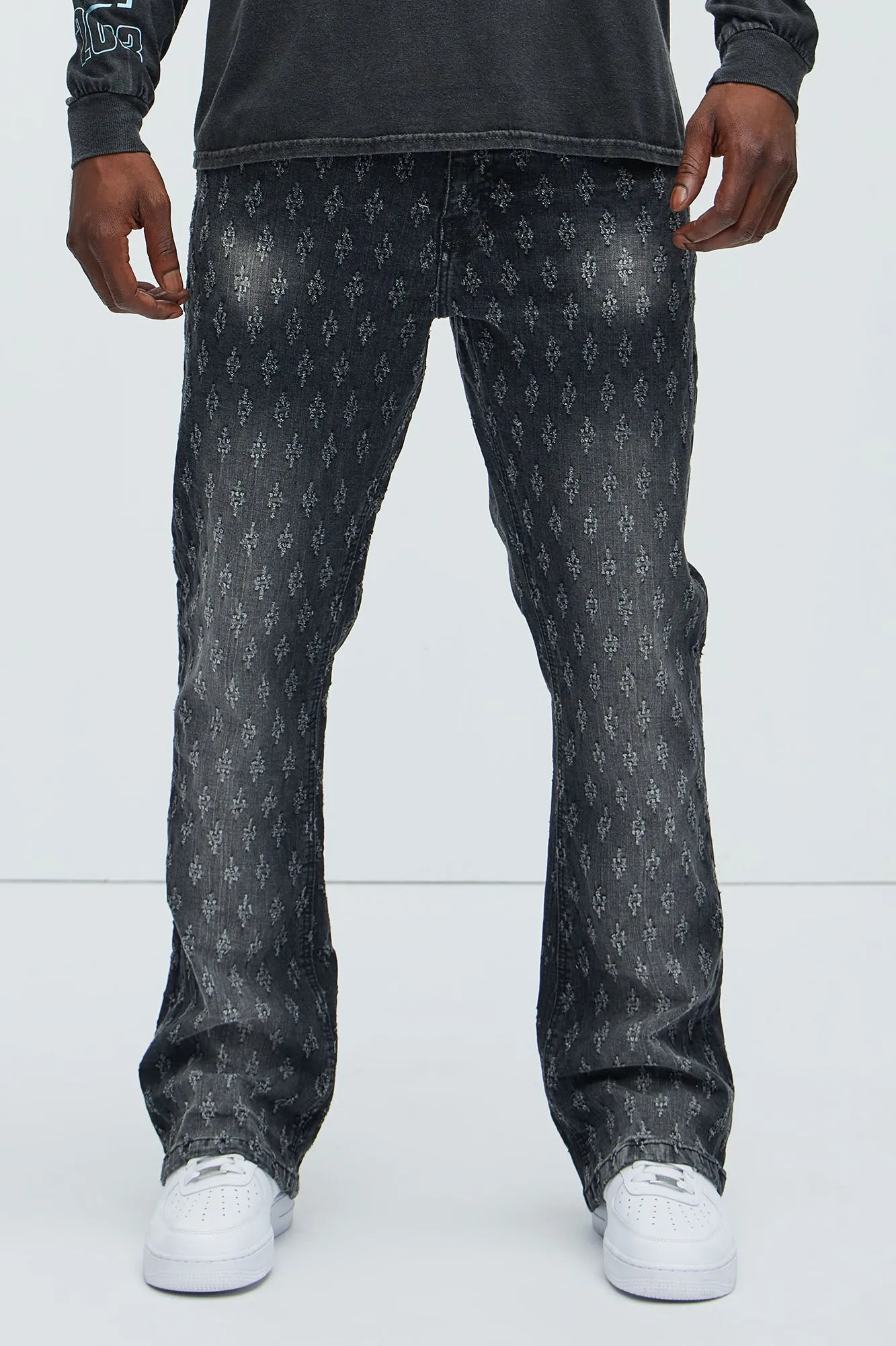 Drilled Slim Stacked Flare Jeans - Black Wash sold by Fashion Nova