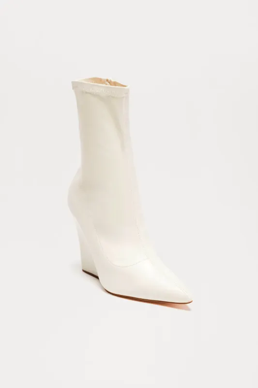 Looks Are Serving Wedge Booties - Cream sold by Fashion Nova