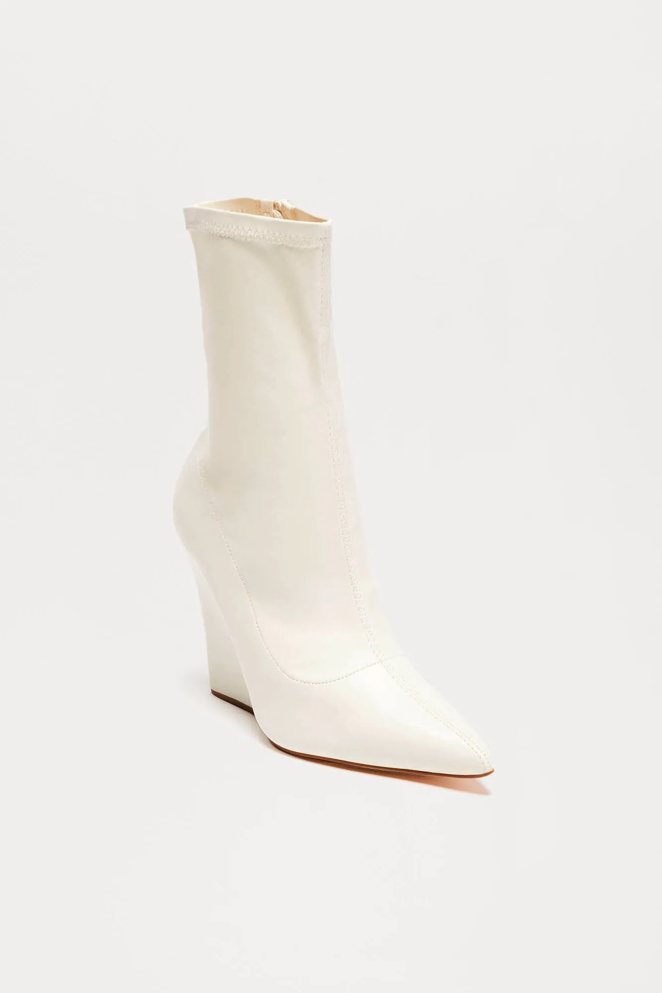 Looks Are Serving Wedge Booties - Cream sold by Fashion Nova