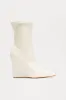 Looks Are Serving Wedge Booties - Cream sold by Fashion Nova