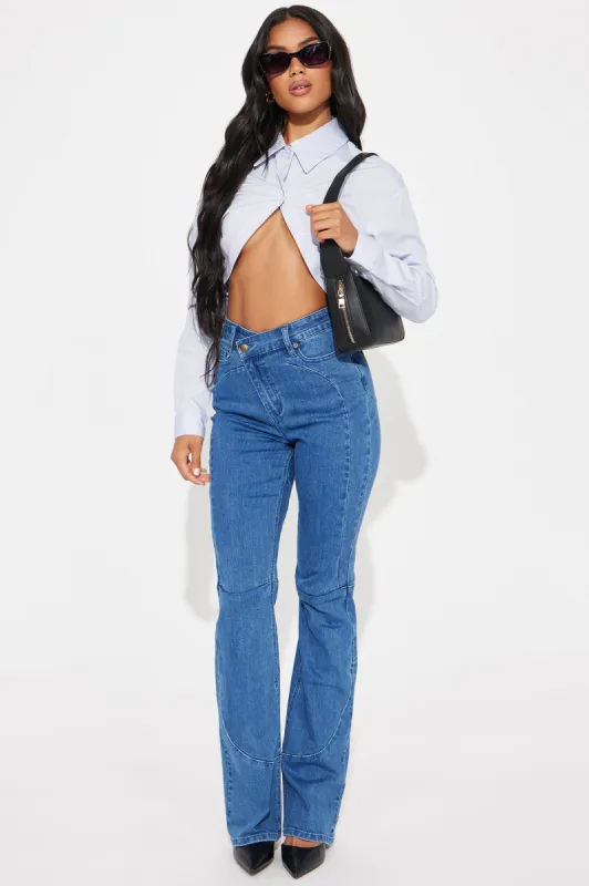Making Deposits Crossover Stretch Bootcut Jeans - Medium Wash sold by Fashion Nova