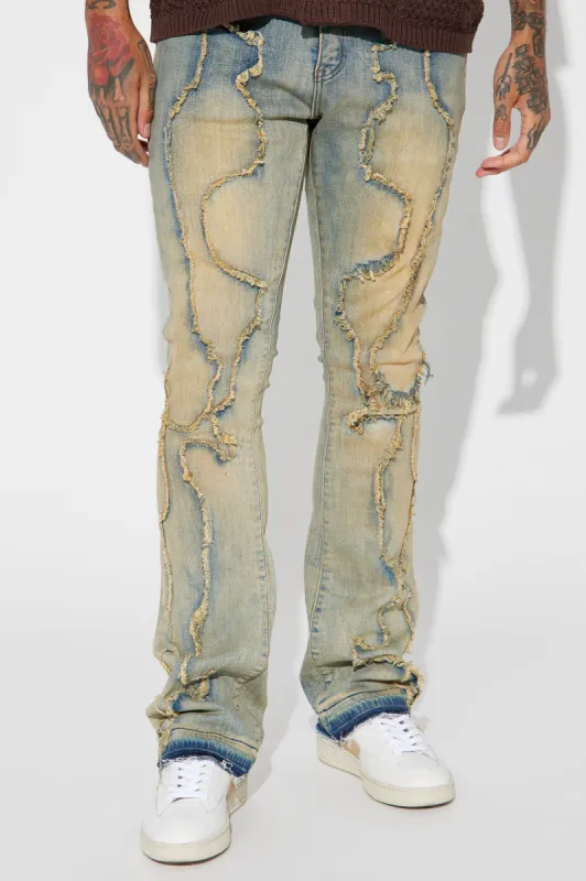 Feeling Good Ripped Stacked Skinny Flare Jeans - Vintage Blue Wash sold by Fashion Nova