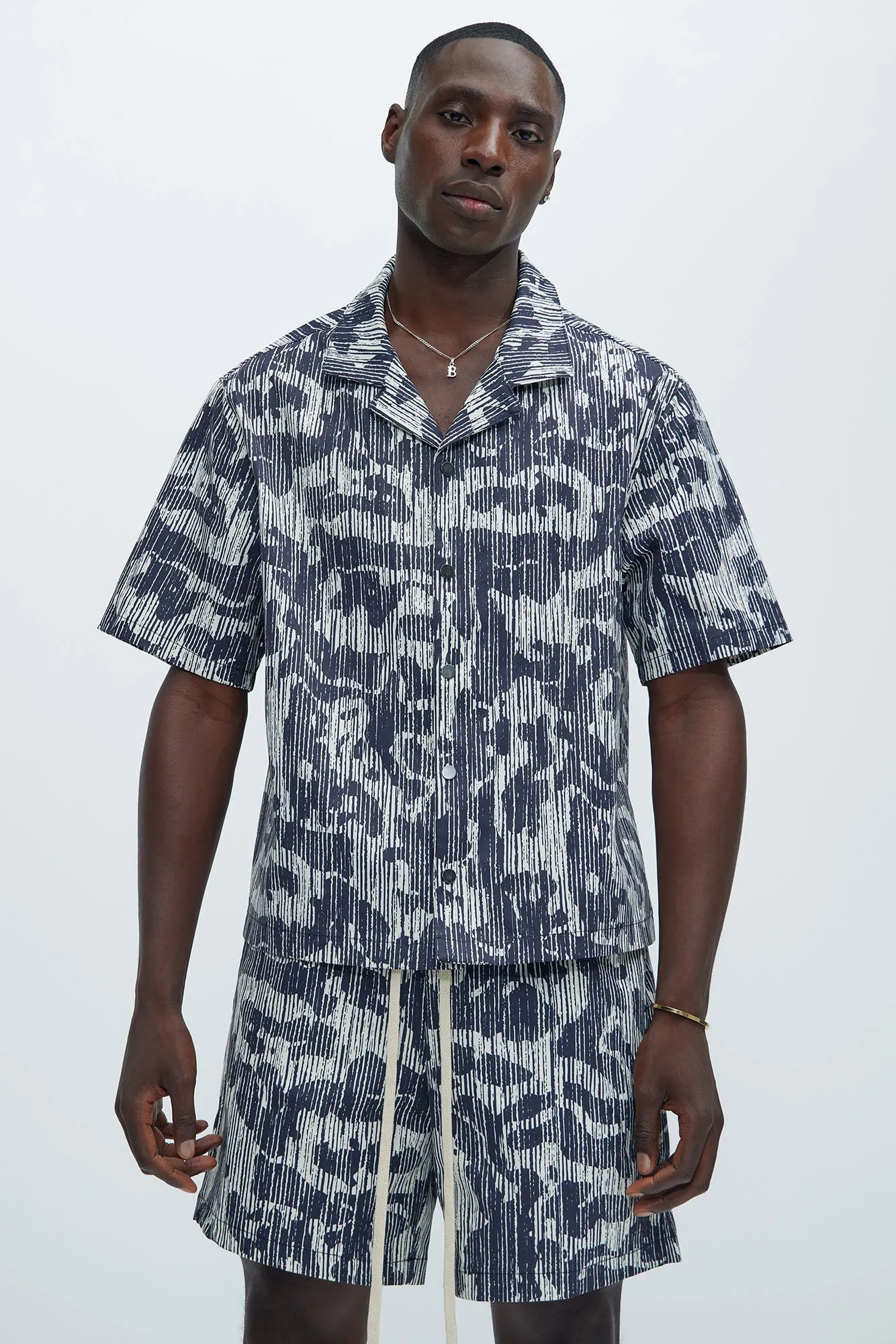 Distressed Camo Print Shirt - Black/White sold by Fashion Nova