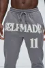 Tyson Self Made Skinny Flare Sweatpants - Grey sold by Fashion Nova