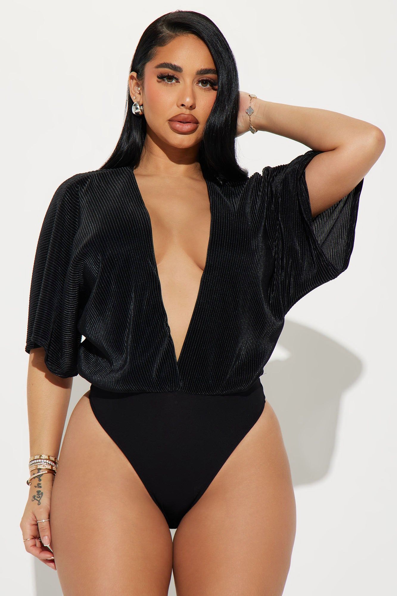 Mariah Plisse Bodysuit - Black sold by Fashion Nova