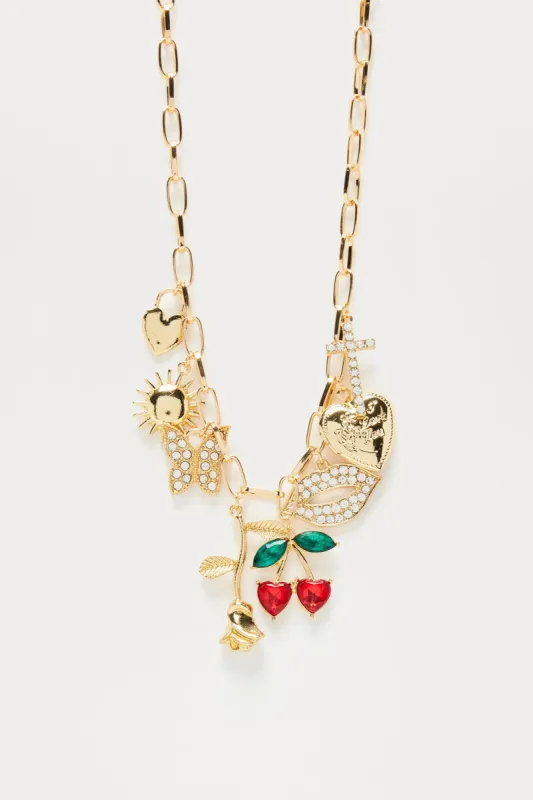 A Few Of My Favorite Things Charm Necklace - Gold/Red sold by Fashion Nova