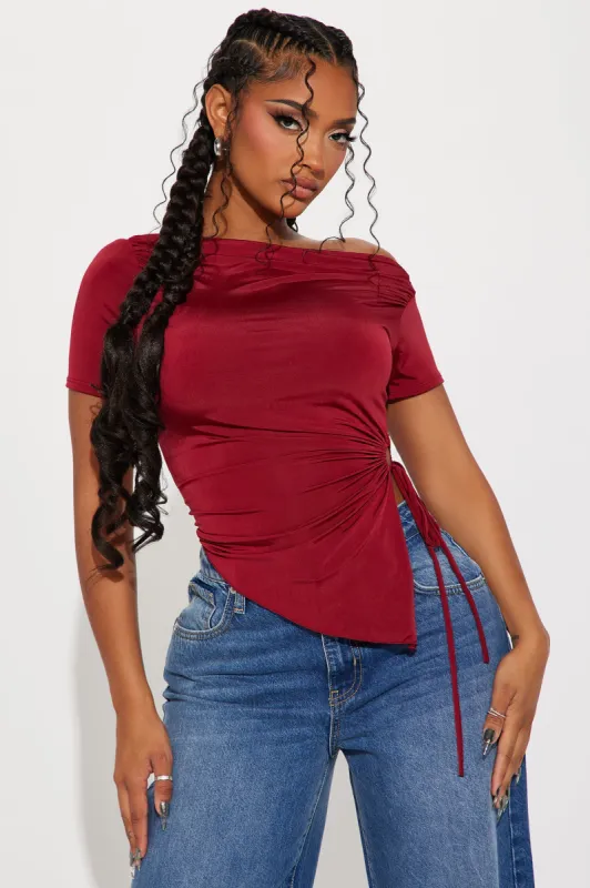Margot Asymmetrical Top - Wine sold by Fashion Nova