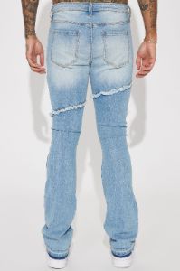 Caught In The Cycle Stacked Skinny Flare Jeans - Light Blue Wash sold by Fashion Nova