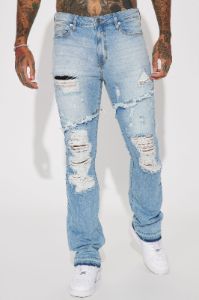 Caught In The Cycle Stacked Skinny Flare Jeans - Light Blue Wash sold by Fashion Nova