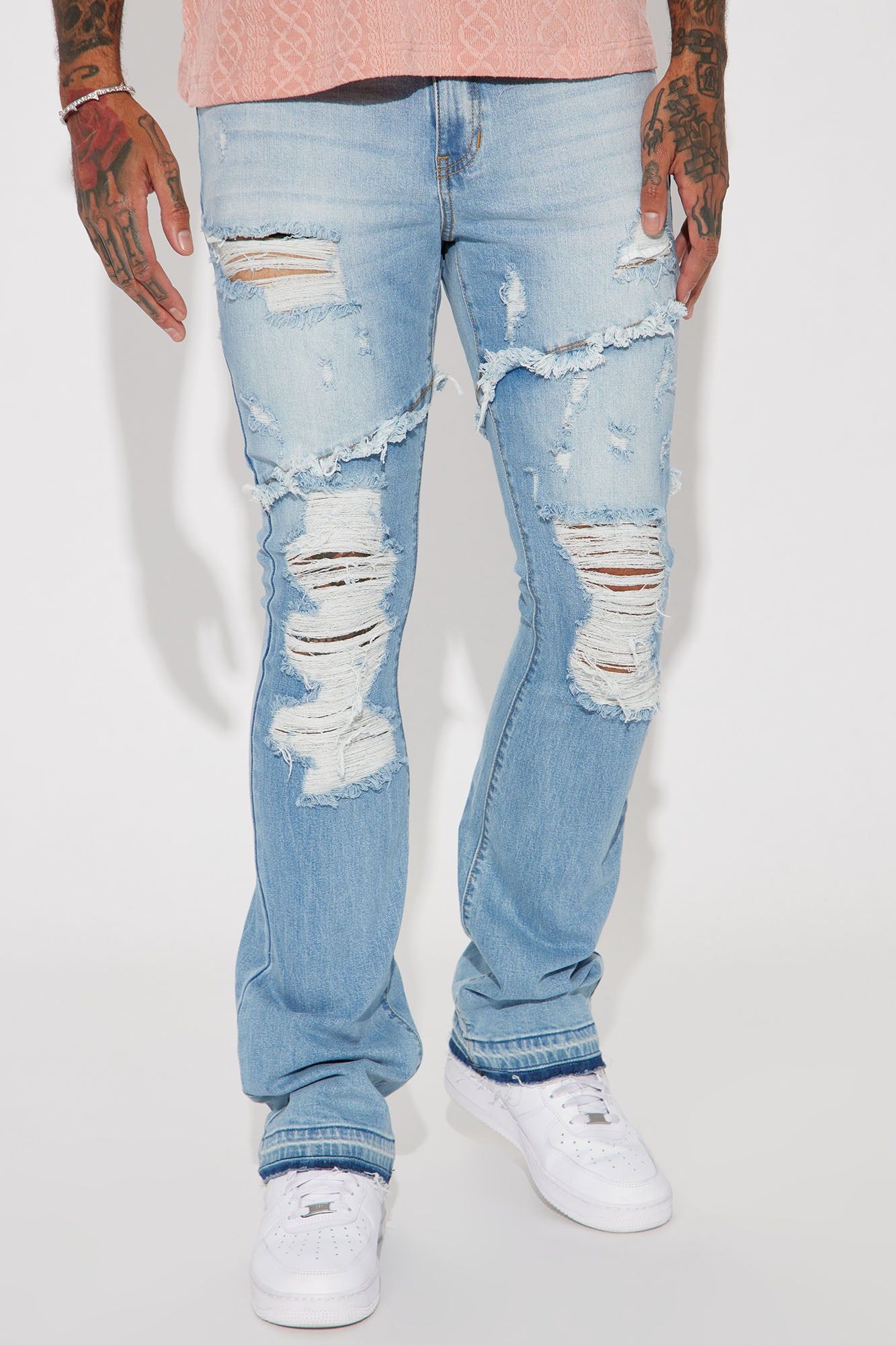 Caught In The Cycle Stacked Skinny Flare Jeans - Light Blue Wash sold by Fashion Nova