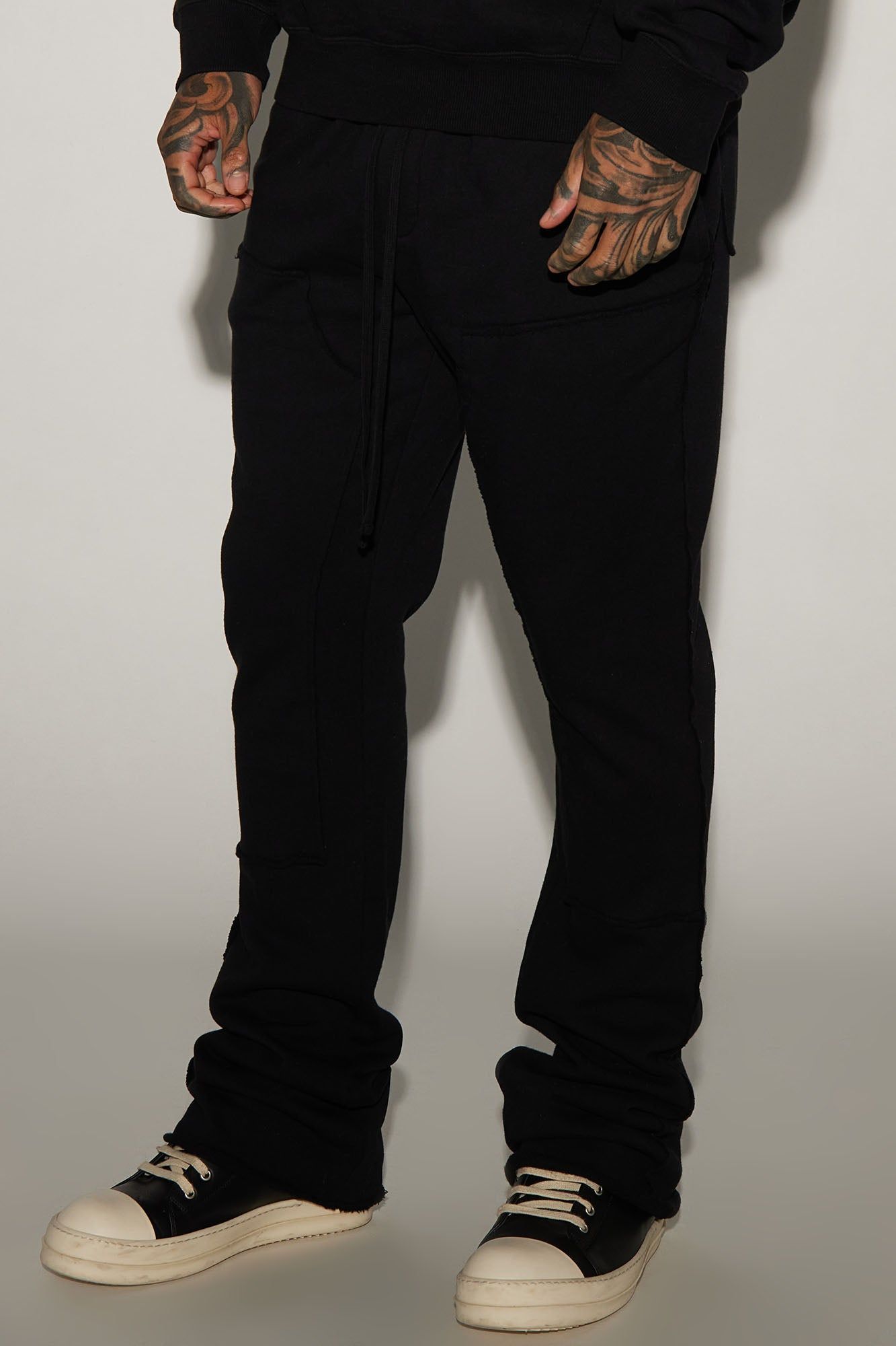 Tyson Frayed Carpenter Flared Sweatpant - Black sold by Fashion Nova