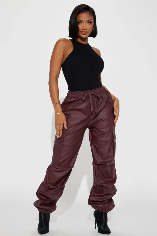 Give Or Take Faux Leather Cargo Jogger - Burgundy sold by Fashion Nova