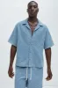 Beck Distressed Shirt - Blue Wash sold by Fashion Nova
