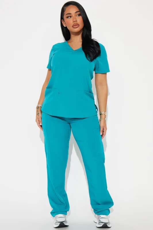 Working Overtime 4FLEX Uniform Scrub Pants - Teal sold by Fashion Nova