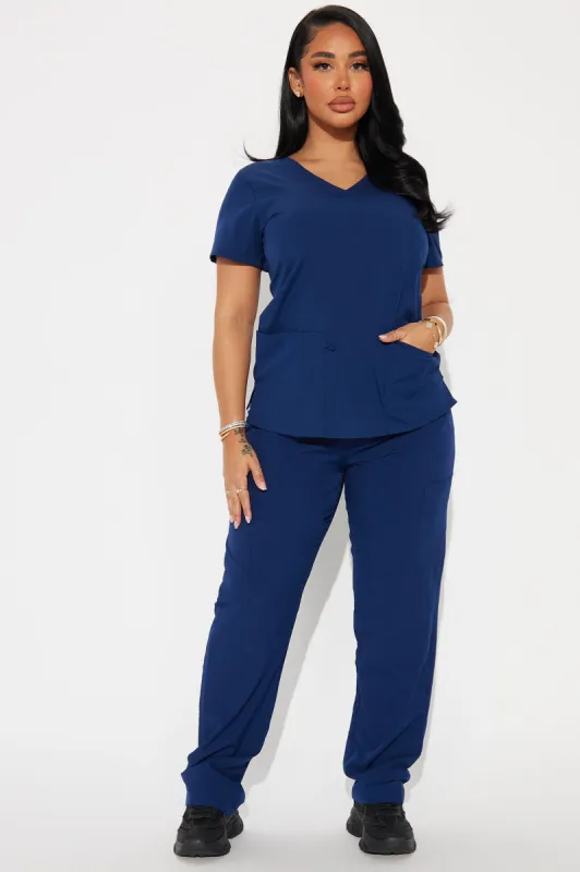 Working Overtime 4FLEX Uniform Scrub Pants - Navy sold by Fashion Nova