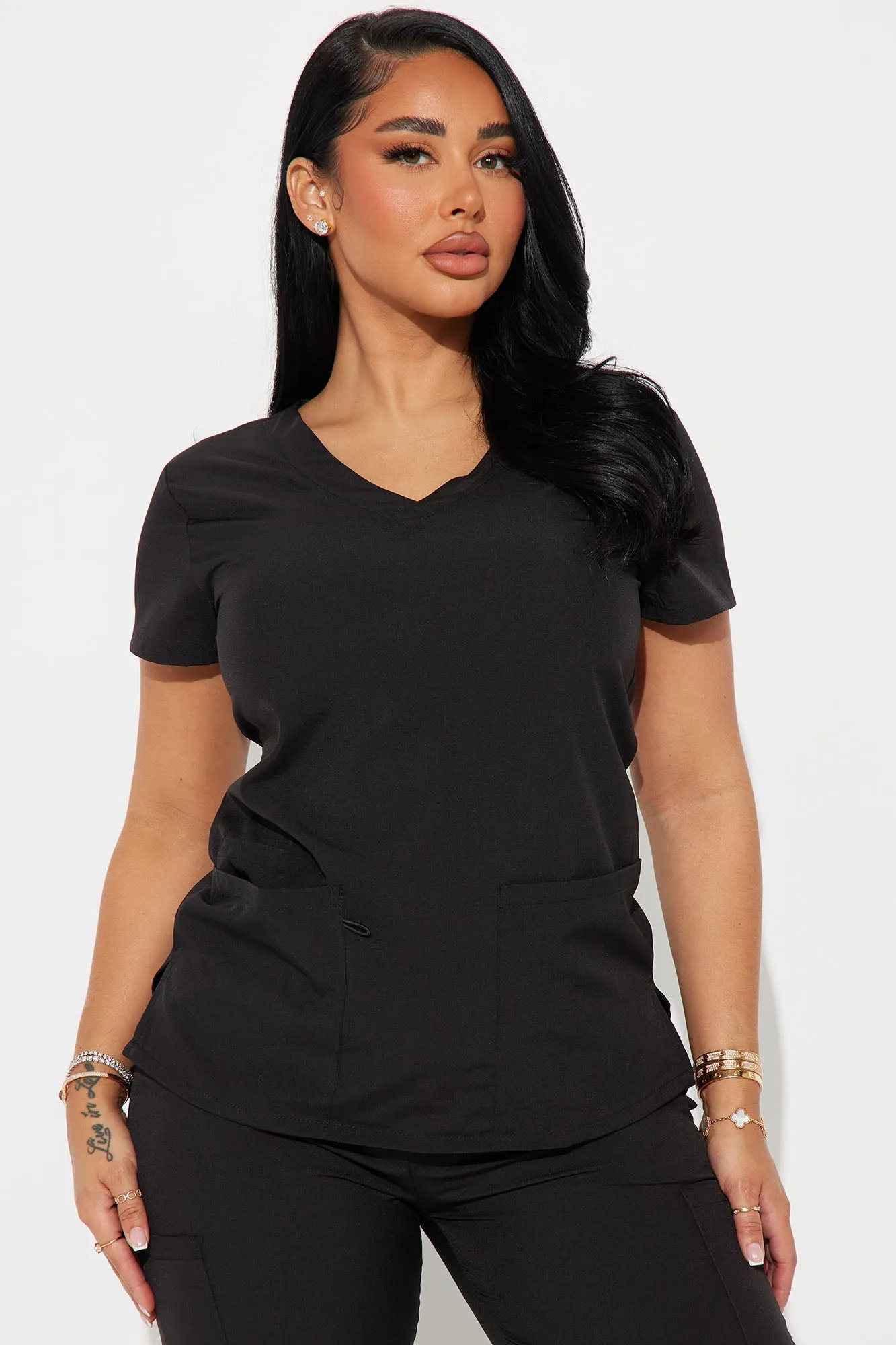 On The Go 4FLEX Uniform Scrub Top - Black sold by Fashion Nova