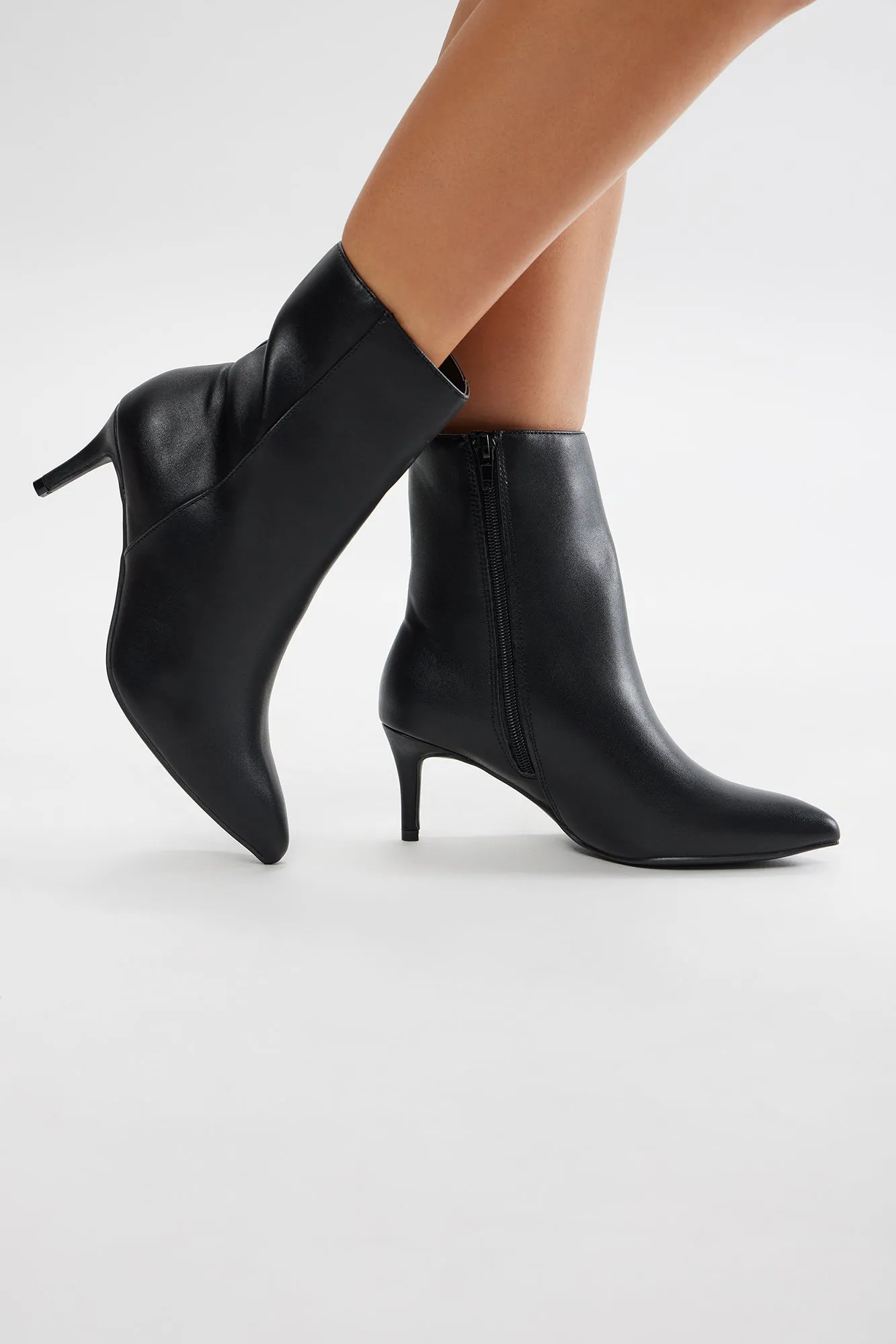 Bryson Heeled Booties - Black sold by Fashion Nova