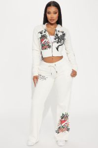 Ed Hardy Dragon Heart Pant - Ivory sold by Fashion Nova