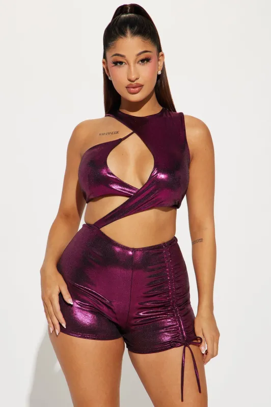 Yuma Metallic Romper - Magenta sold by Fashion Nova