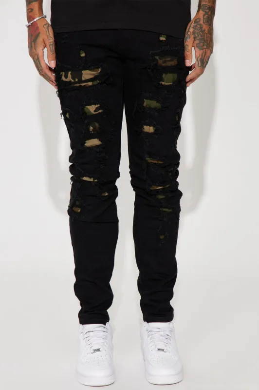 Fuel The Fire Stacked Skinny Jeans - Black sold by Fashion Nova