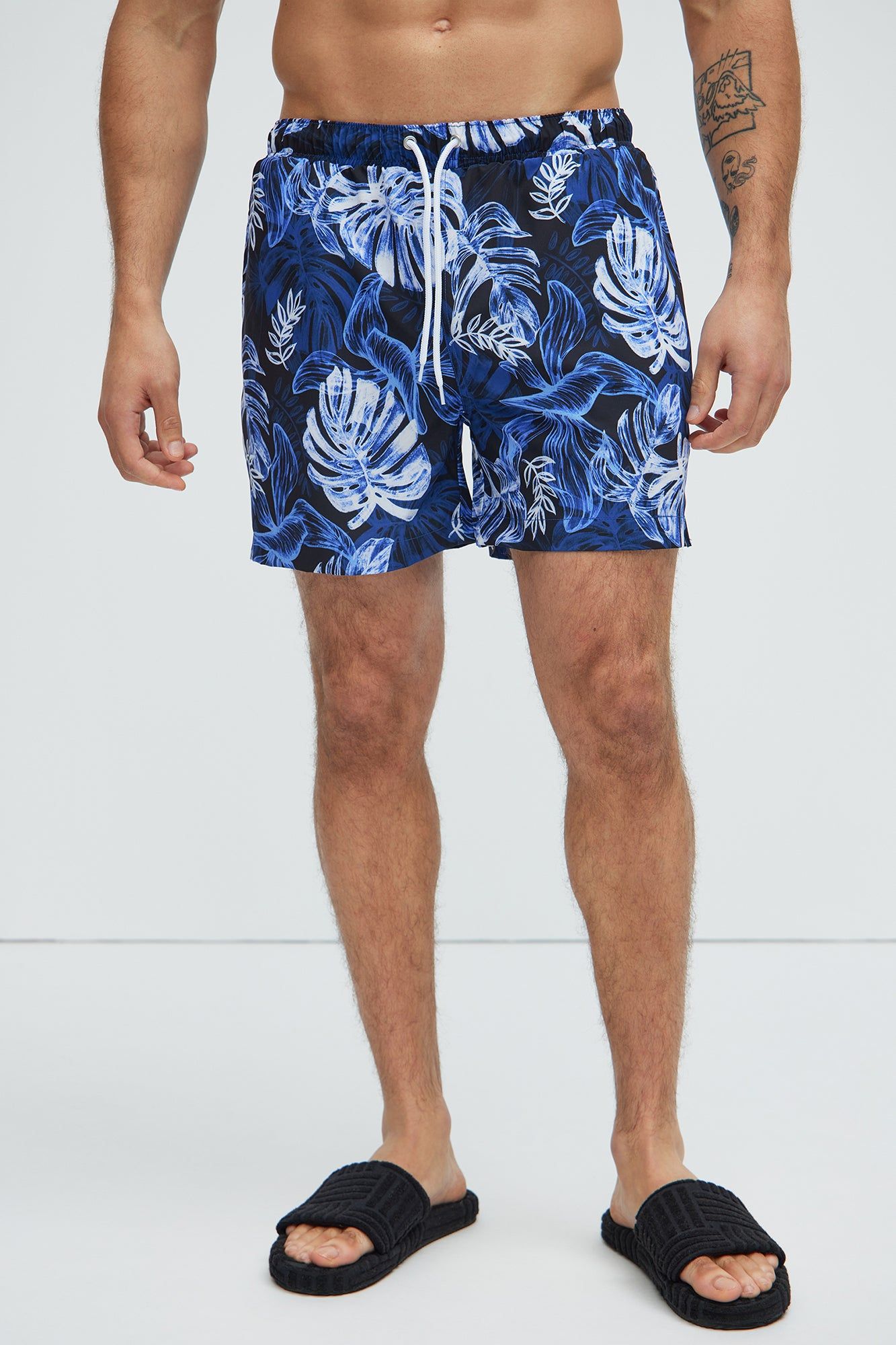 Palm Sketches Swim Trunks - Navy sold by Fashion Nova