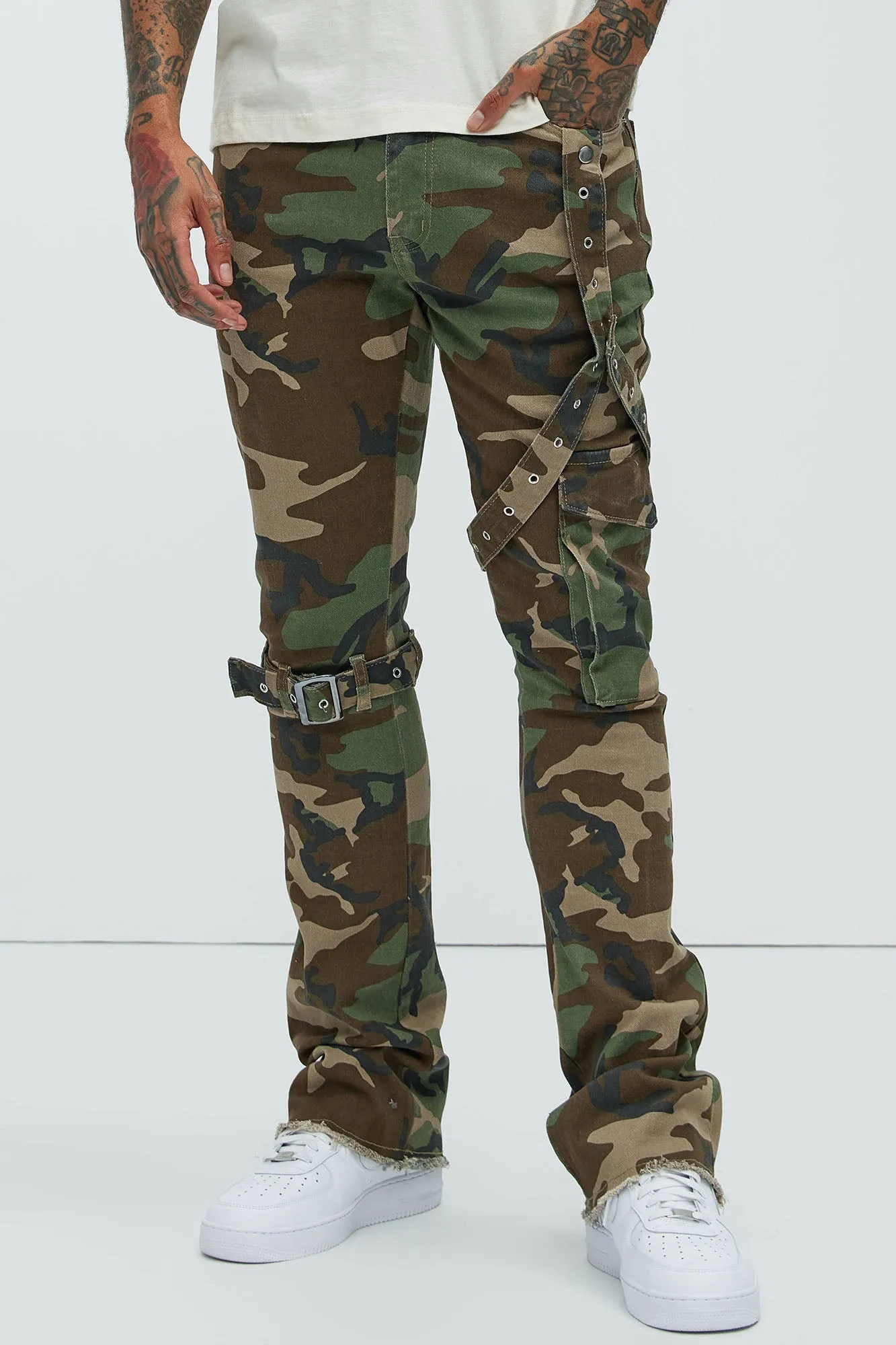 With The Straps Camo Stacked Skinny Flare Pants - Camouflage sold by Fashion Nova