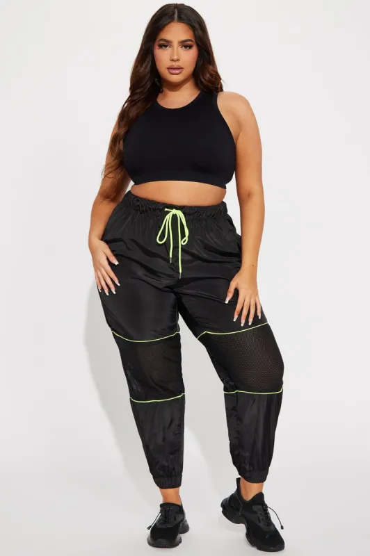 Top Rated Windbreaker Joggers - Black sold by Fashion Nova