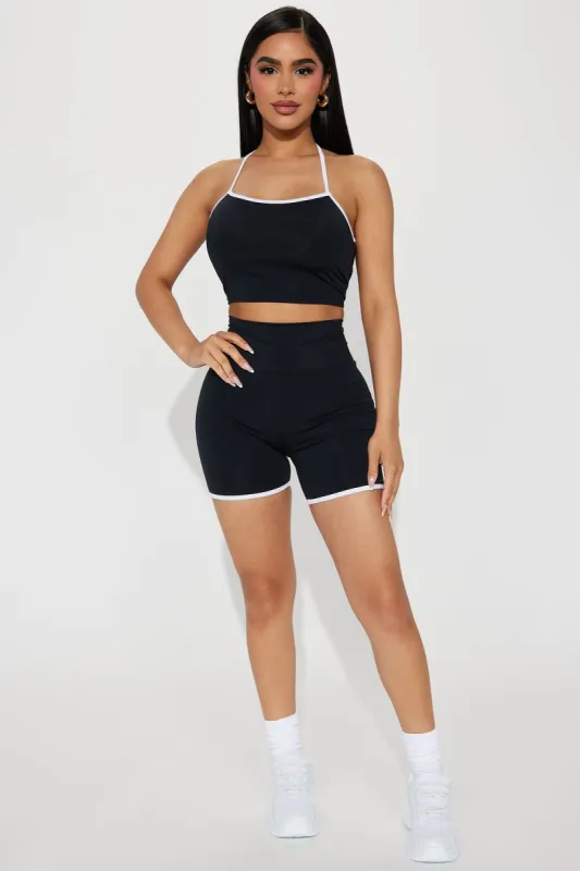 Newest Addition Active Set - Black/White sold by Fashion Nova