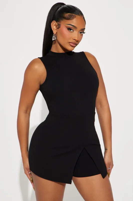 What A Feeling Romper - Black sold by Fashion Nova