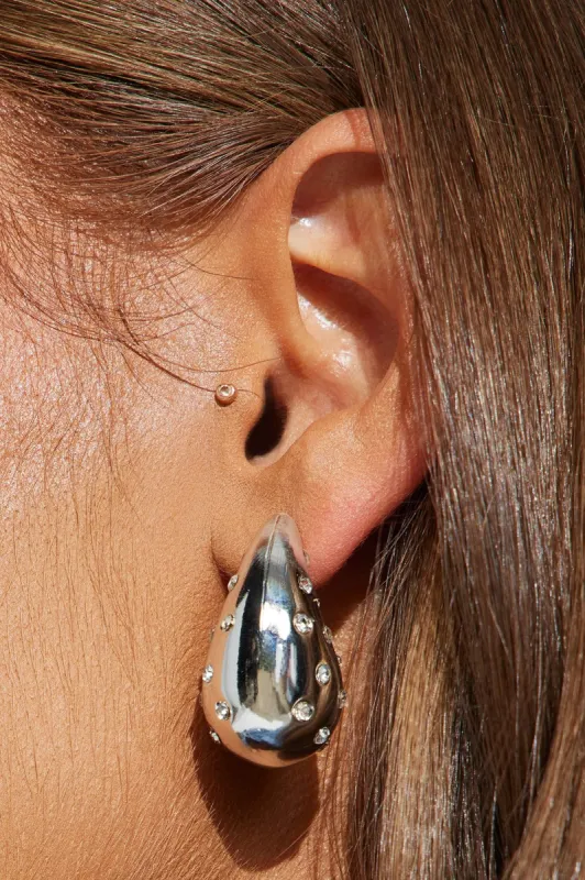 Glistening Waves Earrings - Silver sold by Fashion Nova