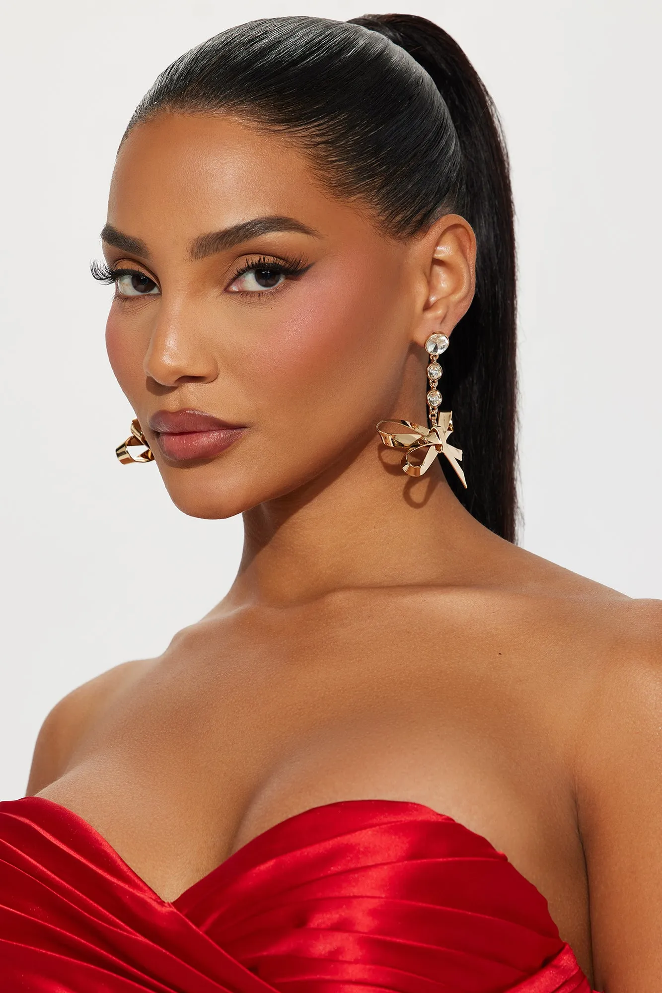 Bow Chic Earrings - Gold sold by Fashion Nova product image thumbnail 2